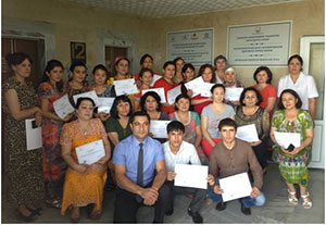 Trainees display their certificates at the conclusion of the cross-border training